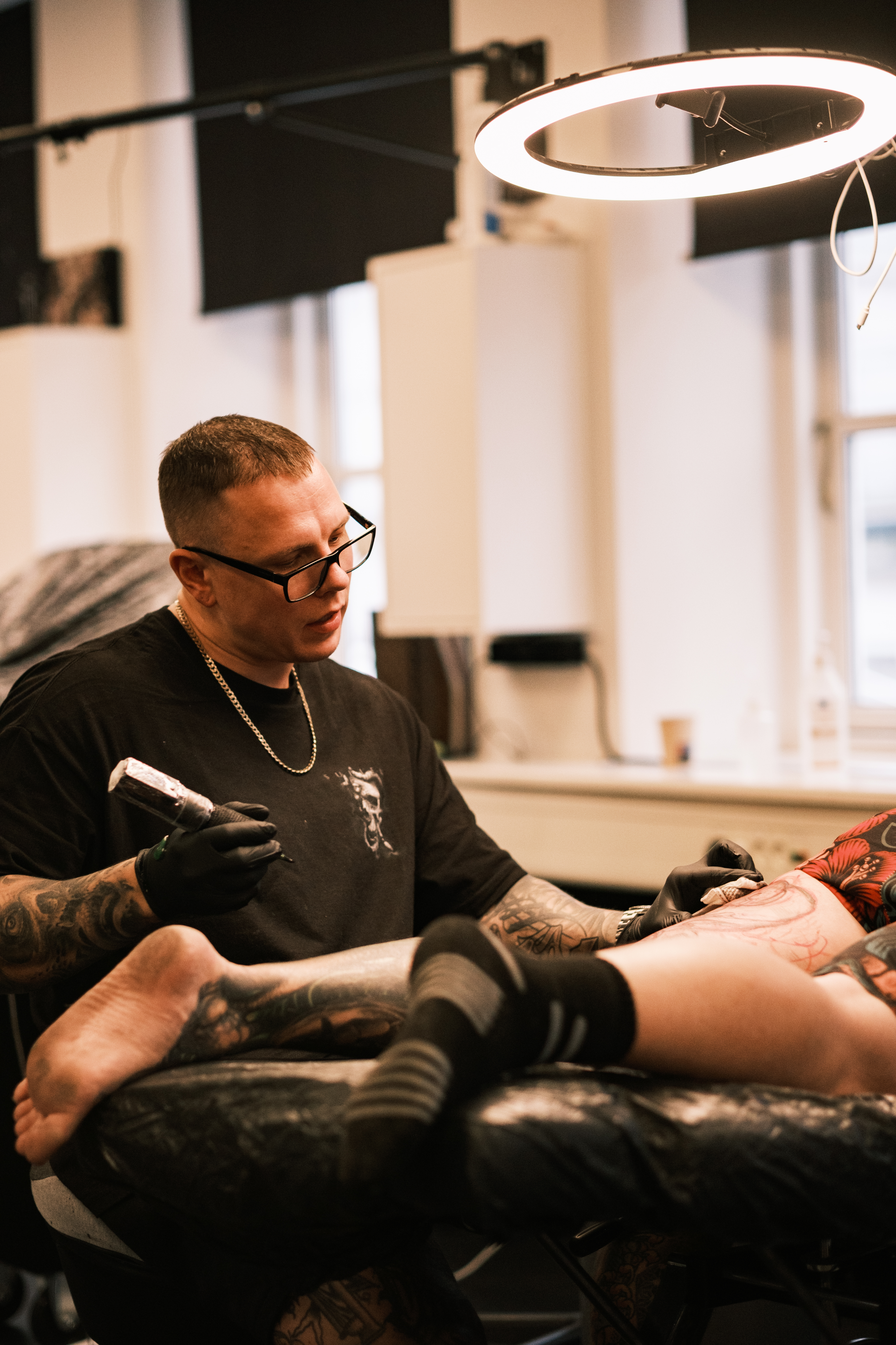 Christian Boye Larson tattooing